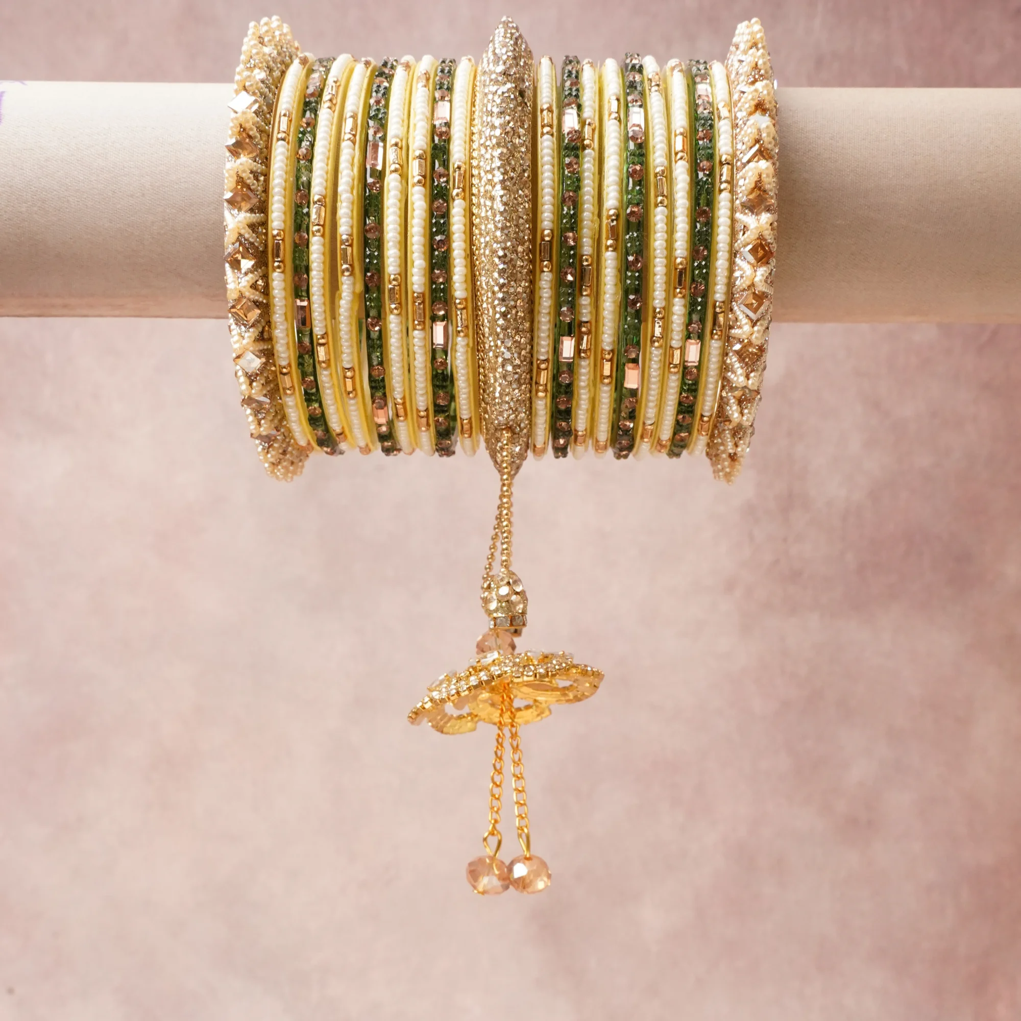 A commanding Forest Green anchors this beautiful set, enriched with accents of Polished Gold, Clear Crystal, Amber Crystal, Silver Mirror that add depth and dimension.

Featuring a striking composition of Gold-toned Metal, Glass Seed Beads, Crystal Rhinestones, Glass Mirror Inlay, Faceted Glass Crystals, Textile Thread, this set carries intricate craftsmanship and strong presence. Grand in form, it is created for moments that deserve to be marked.